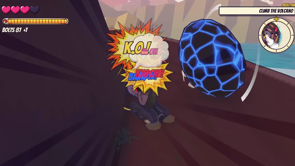 On the volcano road, Tank Bro punches a rolling red rock while a blue one rolls past. K.O.!